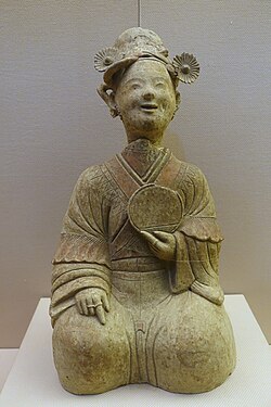 A ceramic statue of a seated woman holding a bronze mirror, Eastern Han – Sichuan Provincial Museum Chengdu