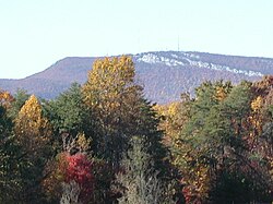 A view of Sauratown Mountain, topped with a broadcast tower, from a distance