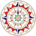More ornate compass rose, with letters of traditional winds, a cross pattée (referring to Jerusalem) for east, and a compass needle as north mark, from a nautical chart by Jorge de Aguiar (1492)