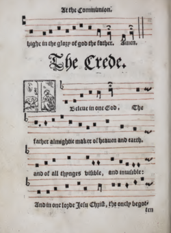 Paper with plainchant written onto it with printed letters.