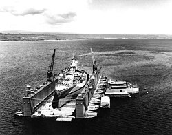 AFDB-1 with USS West Virginia (BB-48) high and dry in the dock November 1944[107]