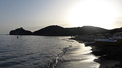 View of the beach of Rocchette at sunset