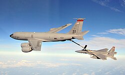 A F-15C Eagle is refueled by a KC-135R Stratotanker, both aircraft are from the 18th Wing based at Kadena Air Base, Japan.
