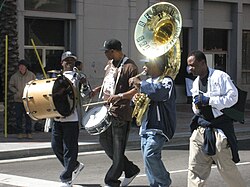 Tabb (on snare drum) in a second-line parade in New Orleans (2007)