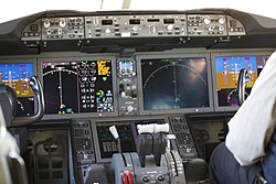 EICAS of a Boeing 787 at the center-left
