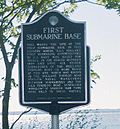 Holland Torpedo Boat Station Plaque stating New Suffolk, New York's claim to be the first submarine base.