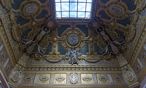 Neoclassical sculpted decoration on the ceiling of the Salon Carré, Louvre Palace, by Pierre-Charles Simart, 1851[52]