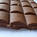 Milk chocolate contains milk and a lower amount of chocolate liquor.