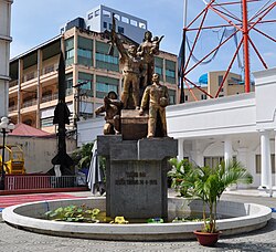 A large statue featuring several Vietnamese soldiers