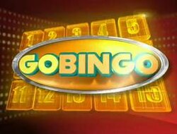 An image with numbers displayed on orange boxes, over a red background. The show title is displayed on the center of the image.