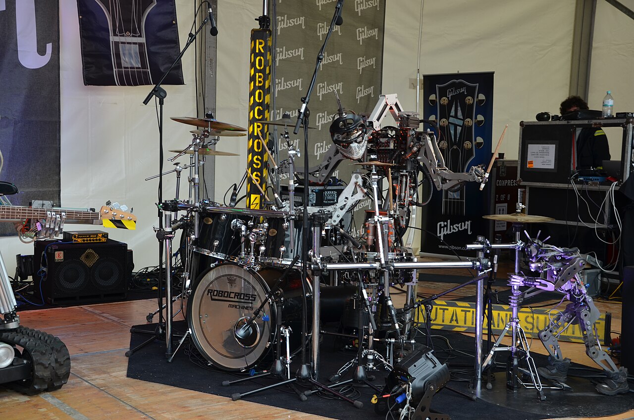 Compressorhead - StickBoy from Robocross Machine on drum, StickBoy junior on Hi-Hat - Musikmesse Frankfurt 2013.jpg