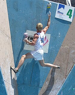 A climber doing the bridging technique