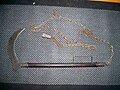 Japanese sickle weapon with a chain and iron weight attached "kusarigama"