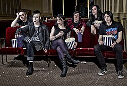 The Birthday Massacre. Left to right: Rhim, Rainbow, Chibi, Owen, Nate Manor, Michael Falcore