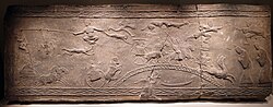 A Han dynasty brick relief with acrobats