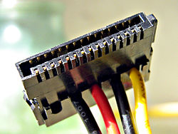 SATA Power Connector (This example is missing an orange 3.3 V wire running to the connector.)
