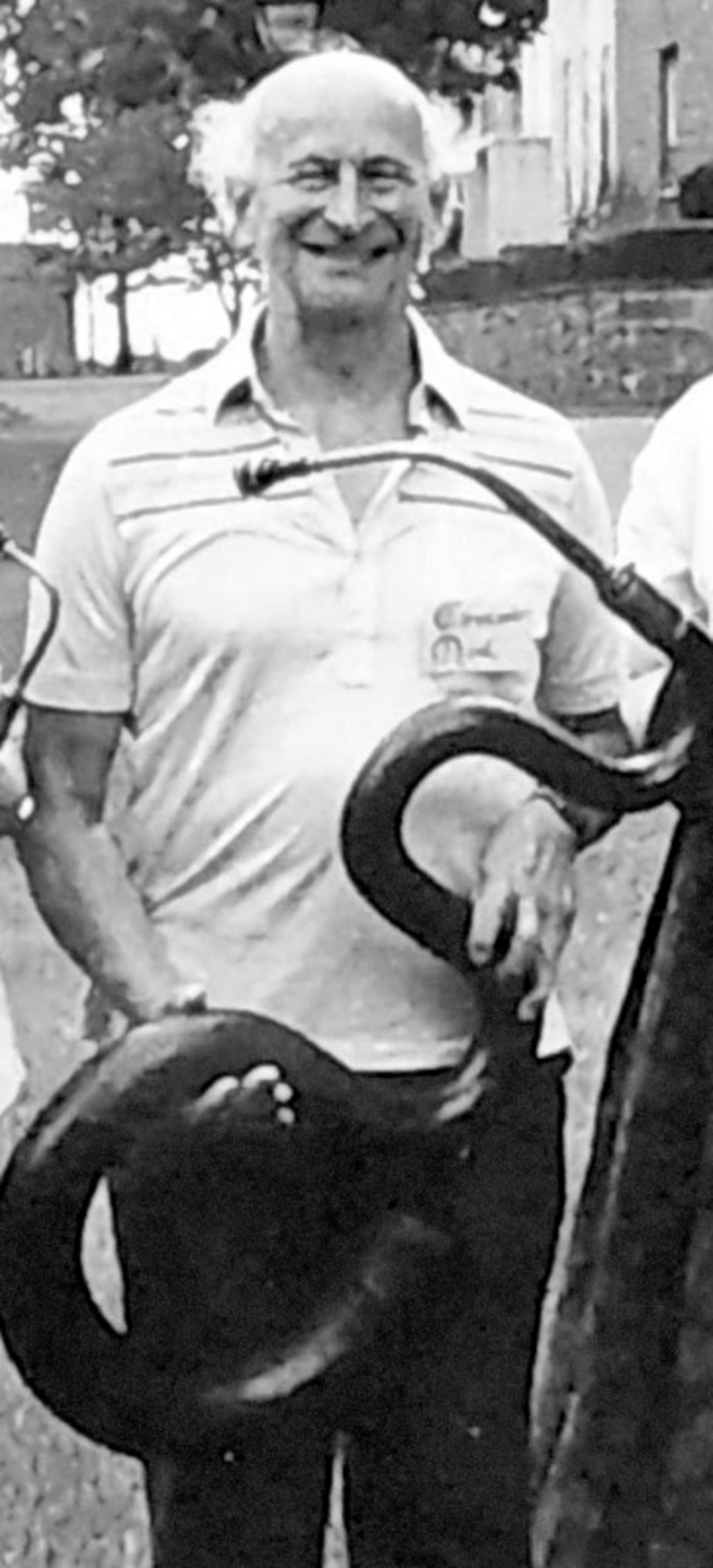 Christopher Monk with serpent 1986 greyscale.png