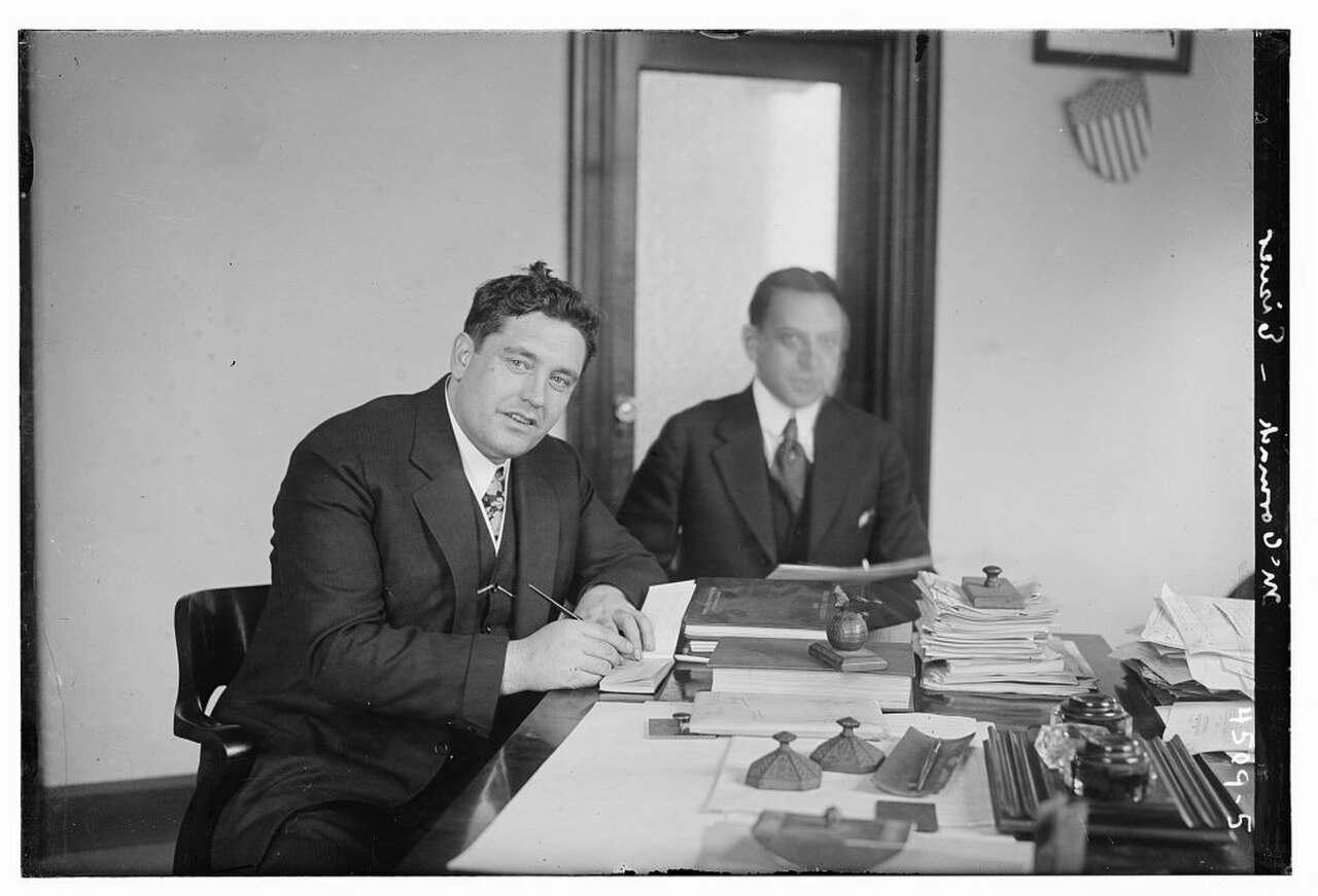 John McCormack, the singer, put into the hands of Mark Eisner, Collector of Internal Revenue for the Third New York District $75,000 on March 6, 1918.jpg