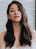 Headshot of Arden Cho looking straight at the camera.
