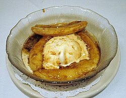 Bananas Foster, made of bananas and vanilla ice cream with a sauce made of butter, brown sugar, cinnamon, dark rum and banana liqueur