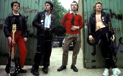 Skrewdriver, c. 1977–1978; (L–R): Kevin McKay, Phil Walmsley, Ian Stuart Donaldson, Ron Hartley.