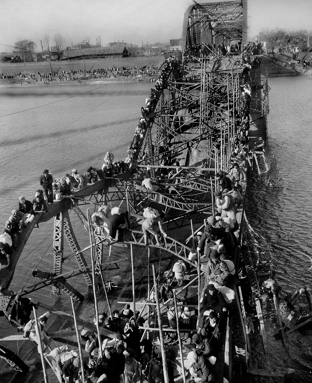 Max Desfor - Flight of Refugees Across Wrecked Bridge in Korea.jpg