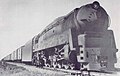 PRR Q1 6130 pulling a Freight Train