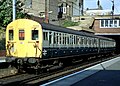A Class 416 EMU in British Rail blue/grey livery calling at Dalston Kingsland