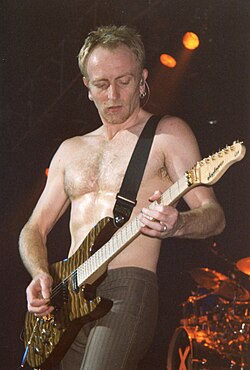 Collen playing guitar