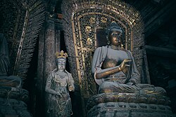 Jin Dynasty (1115–1234) statue of Amoghasiddhi in Shanhua Temple in Datong, Shanxi, China