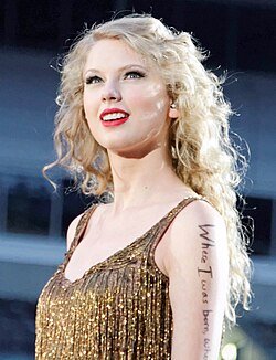 Taylor Swift in a golden dress