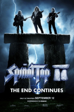 The Spinal Tap members stand atop of a huge Stonehenge stage, where lighting strikes behind it.