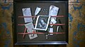 A trompe-l'œil still life of a letter rack, 54 x 67.3 cm, includes a print after Staverenus