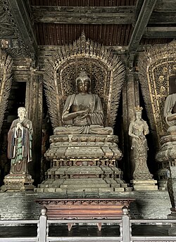 Jin Dynasty (1115–1234) statue of Ratnasambhava in Shanhua Temple in Datong, Shanxi, China