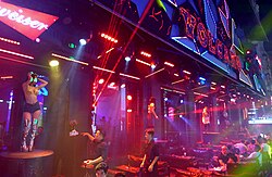 Go-go dancers outside a nightclub