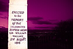 A white memorial with black writing