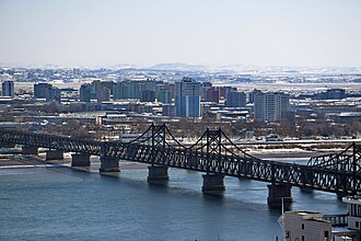 The Sino–Korean Friendship Bridge across the Yalu (Amnokgang) linking Sinuiju and Dandong; the bridge which opened to traffic in 1943 and also fell to destruction by US aerial attacks during the war but was successfully repaired after 1953.