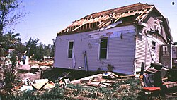 There is damage to mobile homes and other temporary structures becomes significant, and cars and other vehicles can be pushed off the road or flipped. Permanent structures can suffer major damage to their roofs.