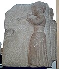 225-175 B.C., Osuna, Greek settlement in Iberian peninsula. Iberian high-relief showing an auletris (woman playing an aulos). It's part of the Sculptures of Osuna.