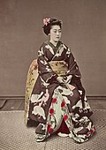 Studio portrait of a seated woman (Kusakabe Kimbei)