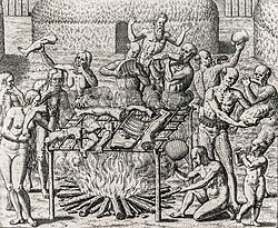 Woodcut showing 12 people holding various human body parts carousing around an open bonfire where human body parts, suspended on a sling, are cooking.