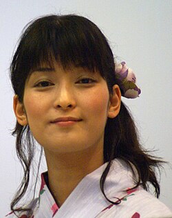Photographs of Ayako Kawasumi and Kari Wahlgren, who voiced Saber.