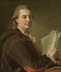 A man in his late 50s wearing a powdered 18th-century style wig. His body is facing to the right. His face has a resolute expression and is turned toward the viewer. His right arm is propped on a table with plotting tools and a book at the bottom of the painting and is holding up several white sheets of paper. He is wearing a large jacket or coat in a purple nuance with a red lingin and with red and blue designs on the sleeves and small of the back. The jacket is in the traditional style of the Sami people of northern Scandinavia.