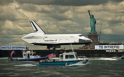 Enterprise moving up the Hudson River to the Intrepid Museum
