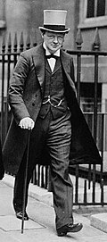 Winston Churchill in a frock coat with grey top hat, 1912