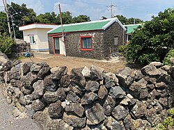 The island's volcanic basalt rock was traditionally used as a building material