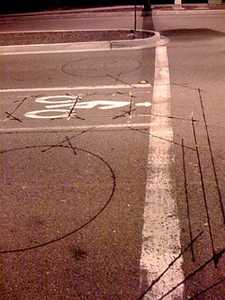 An example of the Inductance loop installed in the road for cars and bikes.