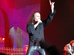 Vocalist Ronnie James Dio making the sign at a concert in 2007. The gesture is quite common within heavy metal culture.