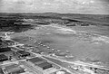 An aerial view of Seletar airfield, Singapore, with RAF Mosquito and Dakota I aircraft parked up