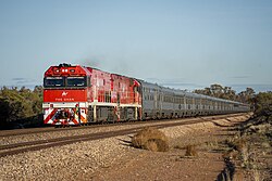 The Ghan passenger train being hauled by an NR class locomotive